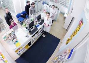 pharmacist suggesting medical drug to buyer in pharmacy